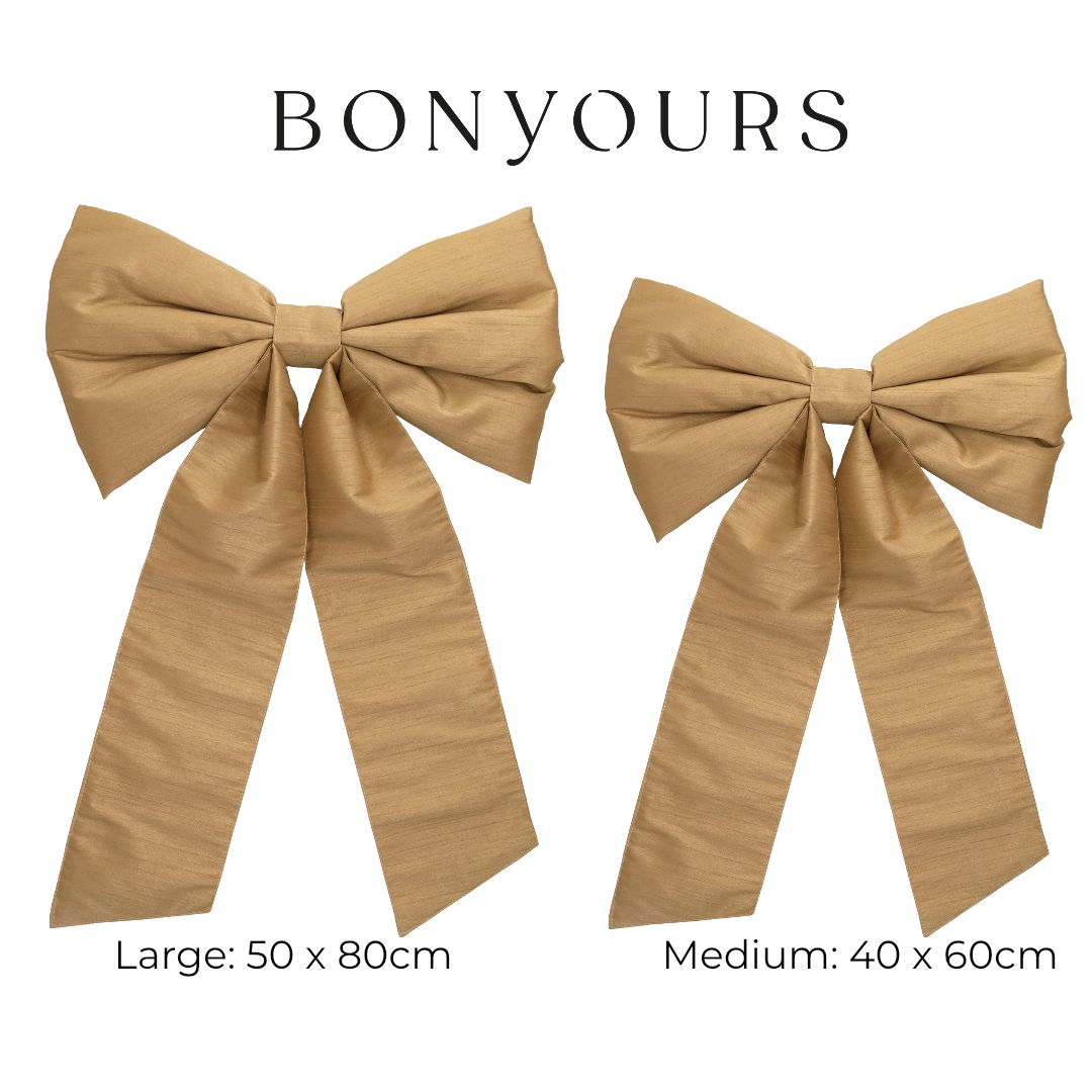 Twee gouden strikformaten large medium